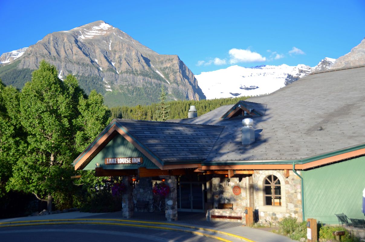 02 Lake Louise Inn With Fairview Mountain and Mount Victoria Beyond Early Morning From Lake Louise Village